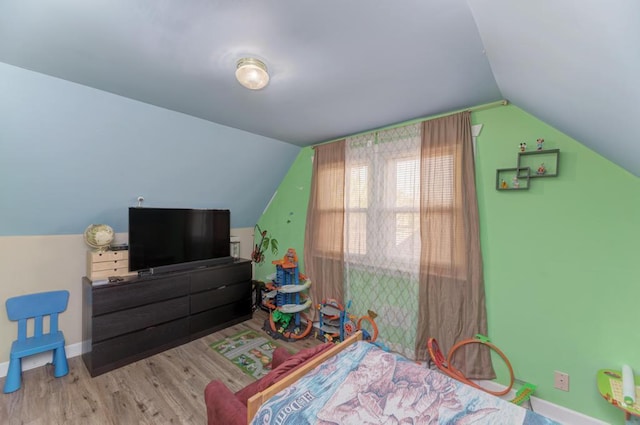 1431 N Hillside Ave, Berkeley, IL 60163 - bedroom with vaulted ceiling, wood finished floors, and baseboards