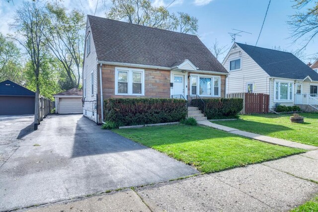 1431 N Hillside Ave, Berkeley, IL 60163 - view of front facade with an outdoor structure, roof with shingles, and a garage