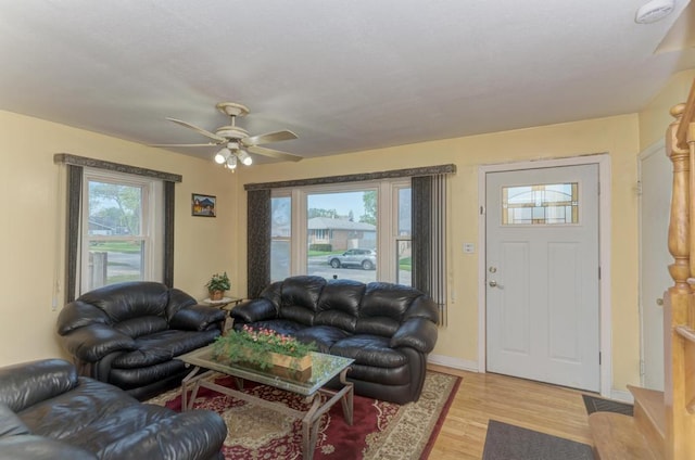 1431 N Hillside Ave, Berkeley, IL 60163 - living room featuring light wood-type flooring, ceiling fan, and baseboards