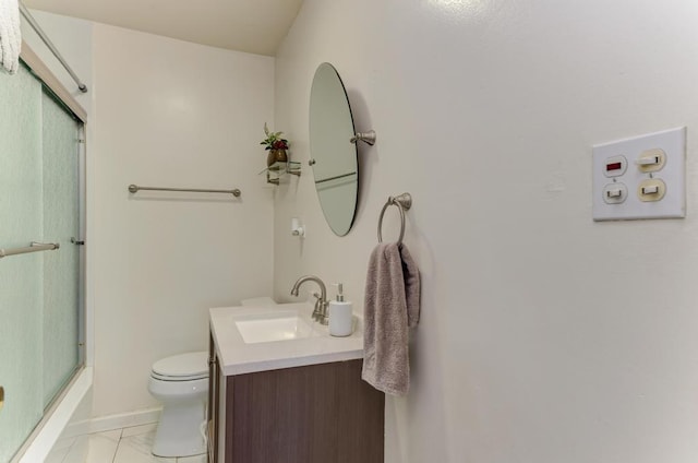 1431 N Hillside Ave, Berkeley, IL 60163 - bathroom featuring toilet, vanity, marble look tiles, and baseboards
