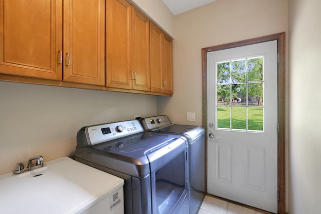 28W624 Berkshire Rd, West Chicago, IL 60185 - laundry area with cabinet space, washing machine and clothes dryer, and light tile patterned floors