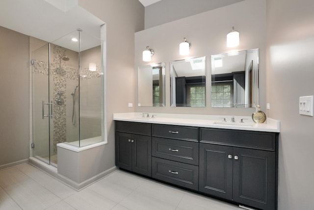 28W624 Berkshire Rd, West Chicago, IL 60185 - full bathroom featuring a shower stall, double vanity, and baseboards
