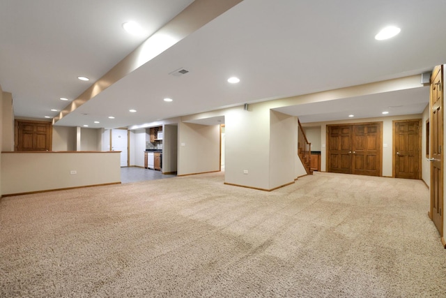 28W624 Berkshire Rd, West Chicago, IL 60185 - unfurnished living room featuring recessed lighting, stairs, carpet flooring, and baseboards