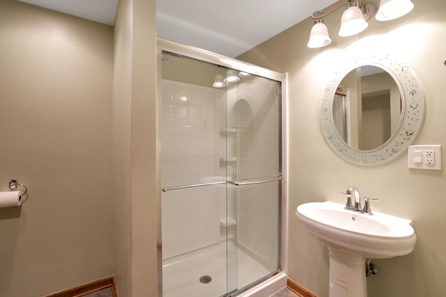28W624 Berkshire Rd, West Chicago, IL 60185 - bathroom with a stall shower and baseboards