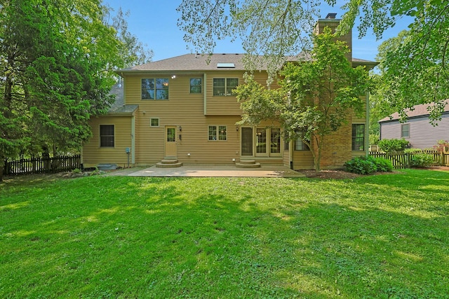 28W624 Berkshire Rd, West Chicago, IL 60185 - back of property featuring a chimney, a patio area, and entry steps