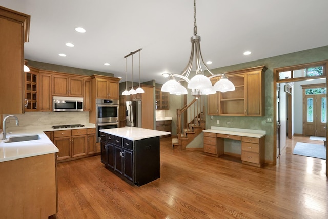 28W624 Berkshire Rd, West Chicago, IL 60185 - kitchen with a sink, stainless steel appliances, recessed lighting, decorative backsplash, and brown cabinetry