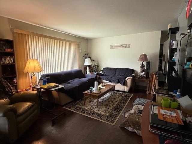 living area with wood finished floors