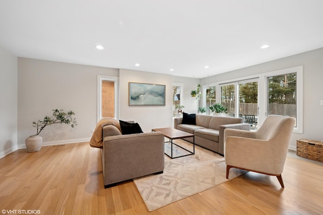 1115 Hunter Rd, Glenview, IL 60025 - living area with light wood-style flooring, baseboards, and recessed lighting
