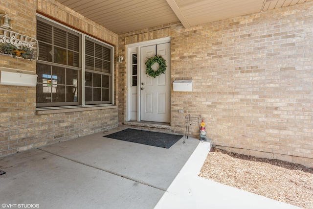 165 Mclaren Dr N, Sycamore, IL 60178 - view of exterior entry with brick siding