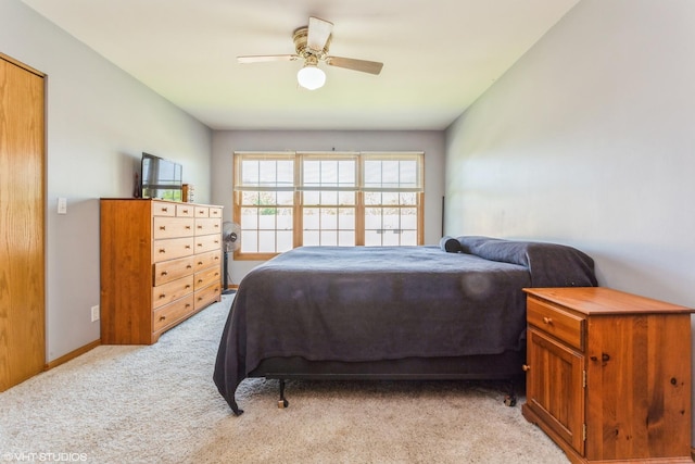 165 Mclaren Dr N, Sycamore, IL 60178 - bedroom with light colored carpet and ceiling fan