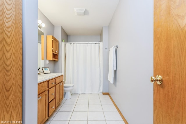 165 Mclaren Dr N, Sycamore, IL 60178 - bathroom featuring toilet, vanity, tile patterned floors, and curtained shower