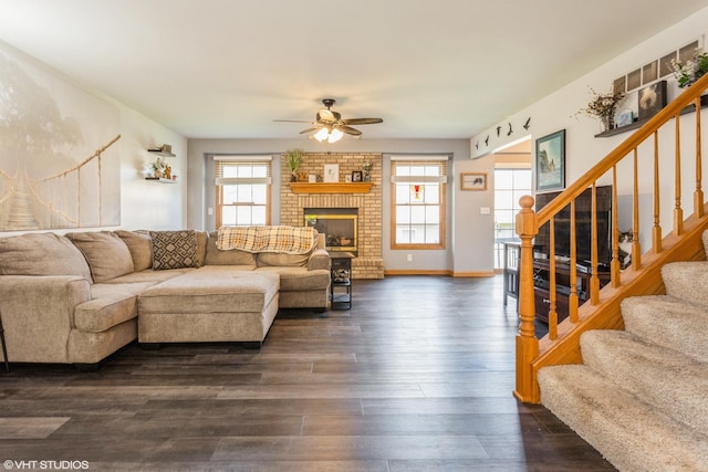 165 Mclaren Dr N, Sycamore, IL 60178 - living area with a ceiling fan, stairway, dark wood finished floors, and a fireplace