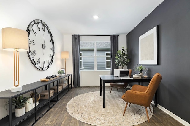 office with wood finished floors and baseboards