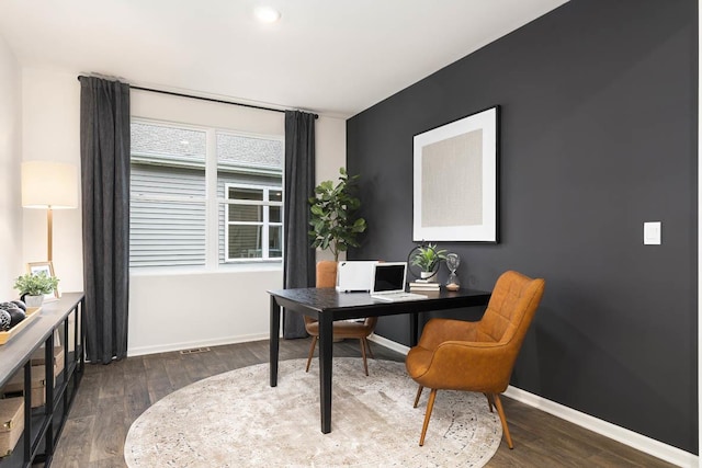 office with wood finished floors and baseboards