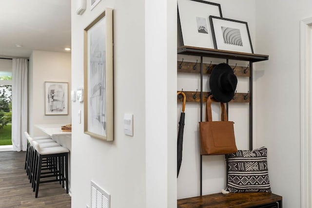 mudroom featuring wood finished floors and recessed lighting