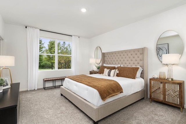 carpeted bedroom featuring recessed lighting and baseboards