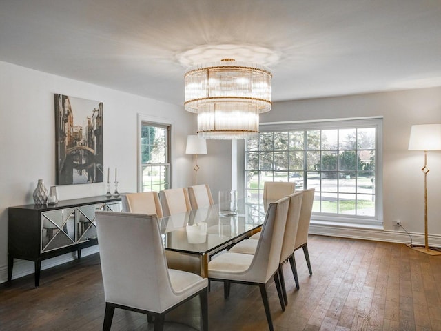8 Wyndham Ct, Oak Brook, IL 60523 - dining space featuring a chandelier, hardwood / wood-style floors, and baseboards