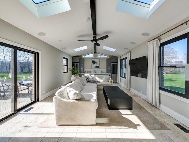 8 Wyndham Ct, Oak Brook, IL 60523 - living area featuring a skylight, lofted ceiling, a ceiling fan, and baseboards