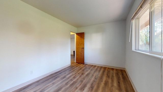 3320 Kimberly Dr, Champaign, IL 61821 - spare room with baseboards and wood finished floors