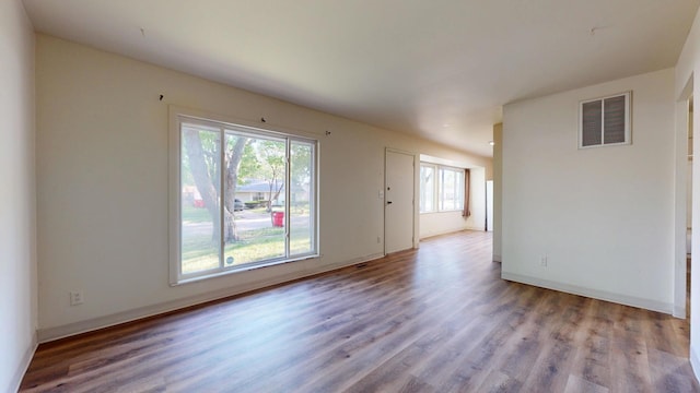 3320 Kimberly Dr, Champaign, IL 61821 - spare room featuring wood finished floors and baseboards