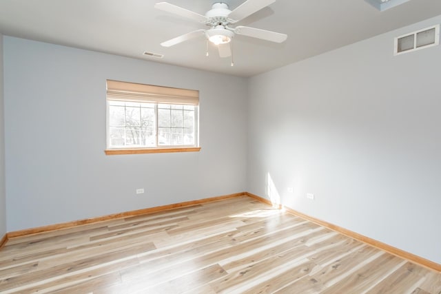 18034 Donatus Dr, Lansing, IL 60438 - spare room featuring baseboards, light wood-type flooring, and visible vents
