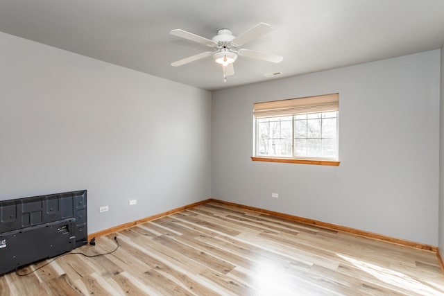 18034 Donatus Dr, Lansing, IL 60438 - unfurnished room featuring a ceiling fan, baseboards, visible vents, and wood finished floors