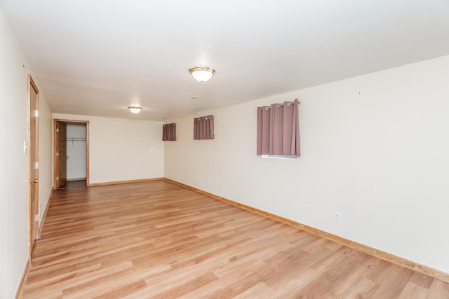 18034 Donatus Dr, Lansing, IL 60438 - spare room featuring baseboards and light wood-style flooring