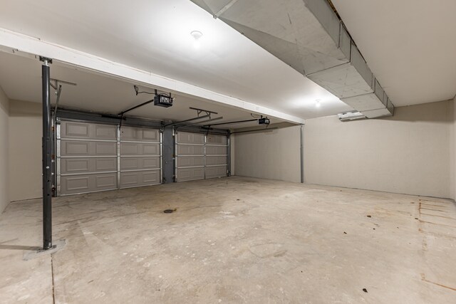 237 N Simmons St, Stockton, IL 61085 - garage featuring a garage door opener