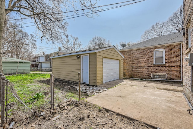 detached garage with fence