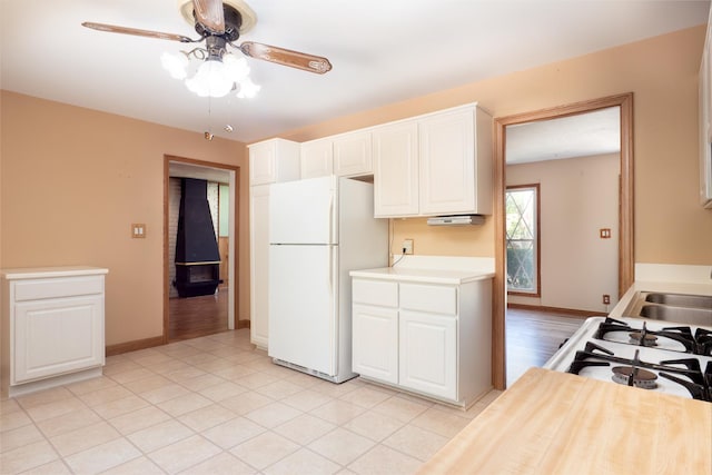 720 Suffolk Pl, Streamwood, IL 60107 - kitchen featuring white appliances, light countertops, a ceiling fan, and white cabinets