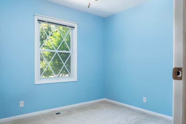 720 Suffolk Pl, Streamwood, IL 60107 - unfurnished room featuring carpet and ceiling fan