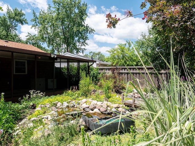720 Suffolk Pl, Streamwood, IL 60107 - view of yard with a sunroom