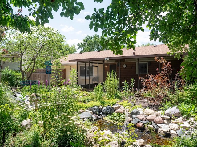 720 Suffolk Pl, Streamwood, IL 60107 - rear view of property with a sunroom