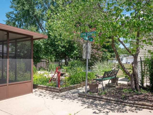 720 Suffolk Pl, Streamwood, IL 60107 - view of patio / terrace with a sunroom