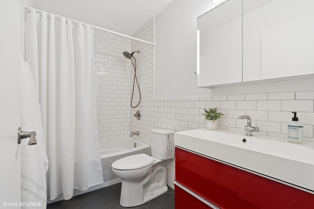full bath featuring toilet, shower / bath combination with curtain, tasteful backsplash, tile walls, and vanity
