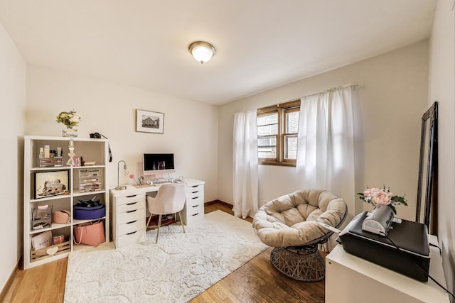 office featuring wood finished floors and baseboards
