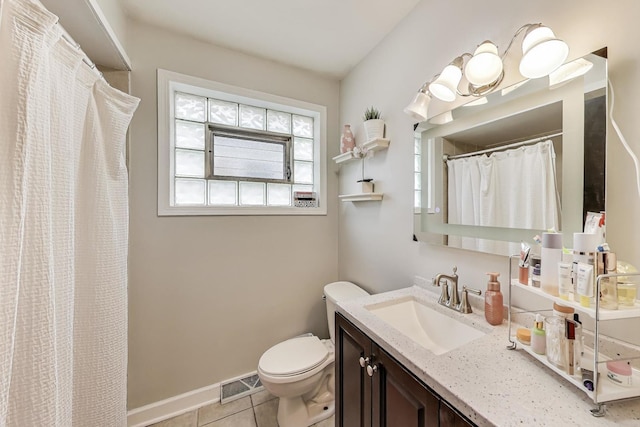 bathroom with toilet, visible vents, curtained shower, tile patterned floors, and vanity