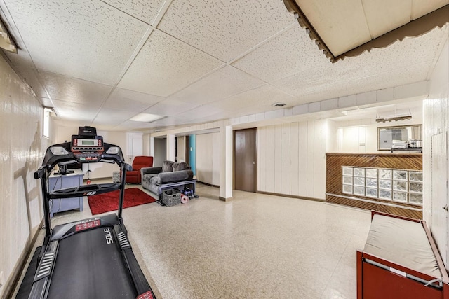 exercise area with a drop ceiling
