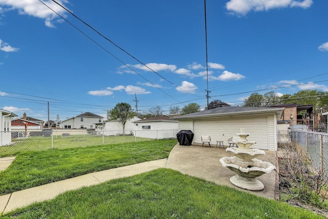 view of yard with a fenced backyard and a patio