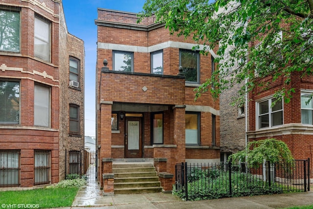 2645 N Mozart St, Chicago, IL 60647 - view of front facade featuring brick siding