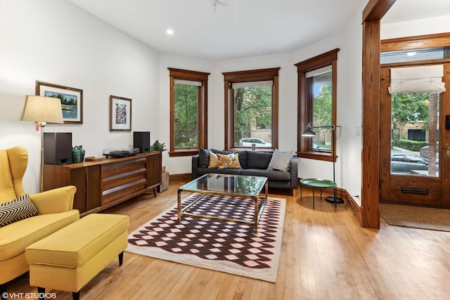 2645 N Mozart St, Chicago, IL 60647 - living area featuring light wood-type flooring, recessed lighting, and baseboards