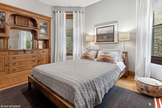 2645 N Mozart St, Chicago, IL 60647 - bedroom with wood finished floors