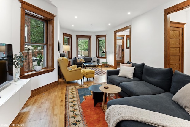 2645 N Mozart St, Chicago, IL 60647 - living room with light wood-type flooring, baseboards, and recessed lighting