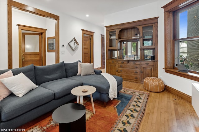 2645 N Mozart St, Chicago, IL 60647 - living room with light wood finished floors, baseboards, and recessed lighting