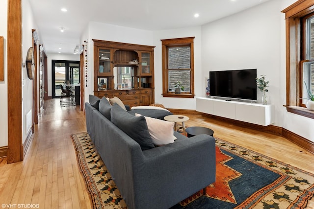 2645 N Mozart St, Chicago, IL 60647 - living area featuring light wood-type flooring, baseboards, and recessed lighting