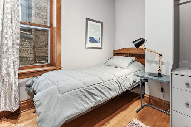 2645 N Mozart St, Chicago, IL 60647 - bedroom with hardwood / wood-style floors