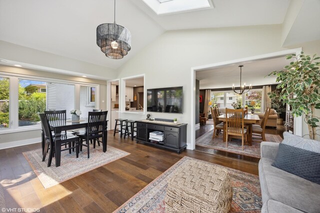 1232 Blackthorn Ln, Deerfield, IL 60015 - dining room featuring a chandelier, dark wood finished floors, a skylight, baseboards, and high vaulted ceiling
