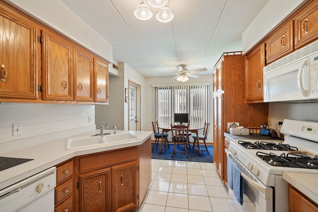 13935 Le Claire Ave Unit 306, Crestwood, IL 60418 - kitchen with white appliances, a sink, brown cabinetry, and ceiling fan