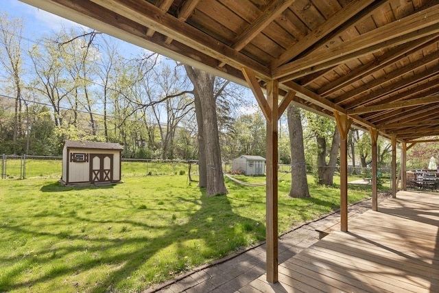 view of yard with a storage shed and an outdoor structure