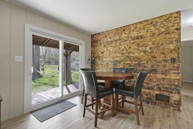 dining room with wood finished floors